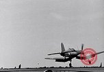 Image of F4U Corsair noses over on landing Pacific Theater, 1943, second 3 stock footage video 65675040837
