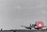 Image of F4U Corsair noses over on landing Pacific Theater, 1943, second 5 stock footage video 65675040837