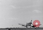 Image of F4U Corsair noses over on landing Pacific Theater, 1943, second 6 stock footage video 65675040837