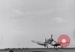 Image of F4U Corsair noses over on landing Pacific Theater, 1943, second 7 stock footage video 65675040837