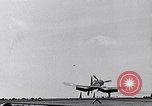 Image of F4U Corsair noses over on landing Pacific Theater, 1943, second 9 stock footage video 65675040837