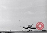 Image of F4U Corsair noses over on landing Pacific Theater, 1943, second 10 stock footage video 65675040837