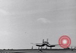 Image of F4U Corsair noses over on landing Pacific Theater, 1943, second 11 stock footage video 65675040837