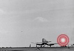 Image of F4U Corsair noses over on landing Pacific Theater, 1943, second 12 stock footage video 65675040837