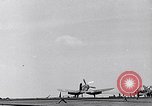 Image of F4U Corsair noses over on landing Pacific Theater, 1943, second 14 stock footage video 65675040837