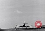 Image of F4U Corsair noses over on landing Pacific Theater, 1943, second 16 stock footage video 65675040837