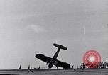Image of F4U Corsair noses over on landing Pacific Theater, 1943, second 20 stock footage video 65675040837