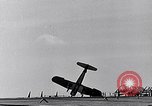 Image of F4U Corsair noses over on landing Pacific Theater, 1943, second 23 stock footage video 65675040837