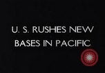 Image of Pacific Islanders in dugout canoes Pacific Theater, 1942, second 21 stock footage video 65675040839