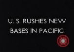 Image of Pacific Islanders in dugout canoes Pacific Theater, 1942, second 23 stock footage video 65675040839