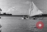 Image of Pacific Islanders in dugout canoes Pacific Theater, 1942, second 27 stock footage video 65675040839