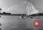 Image of Pacific Islanders in dugout canoes Pacific Theater, 1942, second 28 stock footage video 65675040839