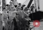 Image of Pacific Islanders in dugout canoes Pacific Theater, 1942, second 34 stock footage video 65675040839