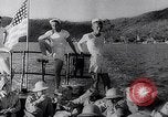 Image of Pacific Islanders in dugout canoes Pacific Theater, 1942, second 37 stock footage video 65675040839