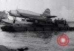 Image of Pacific Islanders in dugout canoes Pacific Theater, 1942, second 48 stock footage video 65675040839