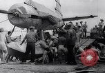 Image of Pacific Islanders in dugout canoes Pacific Theater, 1942, second 50 stock footage video 65675040839