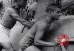Image of Pacific Islanders in dugout canoes Pacific Theater, 1942, second 53 stock footage video 65675040839