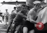 Image of Pacific Islanders in dugout canoes Pacific Theater, 1942, second 54 stock footage video 65675040839