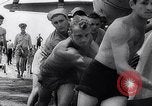 Image of Pacific Islanders in dugout canoes Pacific Theater, 1942, second 55 stock footage video 65675040839