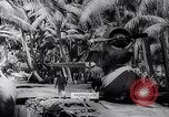 Image of Pacific Islanders in dugout canoes Pacific Theater, 1942, second 57 stock footage video 65675040839