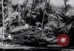 Image of Pacific Islanders in dugout canoes Pacific Theater, 1942, second 58 stock footage video 65675040839