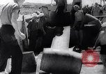 Image of Pacific Islanders in dugout canoes Pacific Theater, 1942, second 61 stock footage video 65675040839