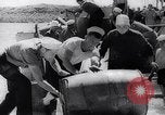 Image of Pacific Islanders in dugout canoes Pacific Theater, 1942, second 62 stock footage video 65675040839