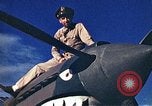 Standbild US Army fliers Blick auf verschiedene Flugzeuge am Flugplatz Kumming China, 1942, aus Sekunde 10 historischem Filmmaterial Videoclip 65675040867