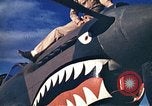 Standbild US Army fliers Blick auf verschiedene Flugzeuge am Flugplatz Kumming China, 1942, aus Sekunde 12 historischem Filmmaterial Videoclip 65675040867