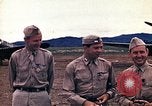 Standbild US Army fliers Blick auf verschiedene Flugzeuge am Flugplatz Kumming China, 1942, aus Sekunde 16 historischem Filmmaterial Videoclip 65675040867