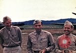 Standbild US Army fliers Blick auf verschiedene Flugzeuge am Flugplatz Kumming China, 1942, aus Sekunde 19 historischem Filmmaterial Videoclip 65675040867