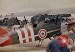 Standbild US Army fliers Blick auf verschiedene Flugzeuge am Flugplatz Kumming China, 1942, aus Sekunde 34 historischem Filmmaterial Videoclip 65675040867