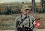 Standbild US Army fliers Blick auf verschiedene Flugzeuge am Flugplatz Kumming China, 1942, aus Sekunde 50 historischem Filmmaterial Videoclip 65675040867