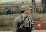 Standbild US Army fliers Blick auf verschiedene Flugzeuge am Flugplatz Kumming China, 1942, aus Sekunde 52 historischem Filmmaterial Videoclip 65675040867