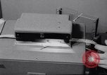 Image of computer weather forecasting in England United Kingdom, 1959, second 34 stock footage video 65675040896
