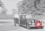Standbild Car-pooling Middle River Maryland USA, 1942, aus Sekunde 11 historischem Filmmaterial Videoclip 65675040912