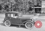 Standbild Car-pooling Middle River Maryland USA, 1942, aus Sekunde 31 historischem Filmmaterial Videoclip 65675040912