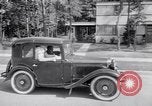 Standbild Car-pooling Middle River Maryland USA, 1942, aus Sekunde 32 historischem Filmmaterial Videoclip 65675040912