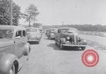 Standbild Car-pooling Middle River Maryland USA, 1942, aus Sekunde 35 historischem Filmmaterial Videoclip 65675040912