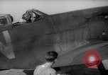 Image of British ground crewman assist RAF pilots of Spitfire fighter planes England United Kingdom, 1940, second 12 stock footage video 65675041005