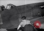 Image of British ground crewman assist RAF pilots of Spitfire fighter planes England United Kingdom, 1940, second 30 stock footage video 65675041005