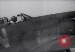 Image of British ground crewman assist RAF pilots of Spitfire fighter planes England United Kingdom, 1940, second 33 stock footage video 65675041005
