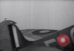 Image of British ground crewman assist RAF pilots of Spitfire fighter planes England United Kingdom, 1940, second 39 stock footage video 65675041005
