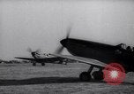 Image of British ground crewman assist RAF pilots of Spitfire fighter planes England United Kingdom, 1940, second 48 stock footage video 65675041005