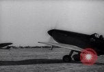 Image of British ground crewman assist RAF pilots of Spitfire fighter planes England United Kingdom, 1940, second 50 stock footage video 65675041005