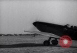 Image of British ground crewman assist RAF pilots of Spitfire fighter planes England United Kingdom, 1940, second 51 stock footage video 65675041005