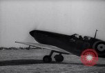 Image of British ground crewman assist RAF pilots of Spitfire fighter planes England United Kingdom, 1940, second 52 stock footage video 65675041005