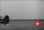 Image of British ground crewman assist RAF pilots of Spitfire fighter planes England United Kingdom, 1940, second 55 stock footage video 65675041005