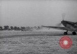 Image of British ground crewman assist RAF pilots of Spitfire fighter planes England United Kingdom, 1940, second 56 stock footage video 65675041005