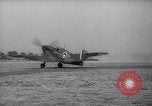 Image of British ground crewman assist RAF pilots of Spitfire fighter planes England United Kingdom, 1940, second 59 stock footage video 65675041005